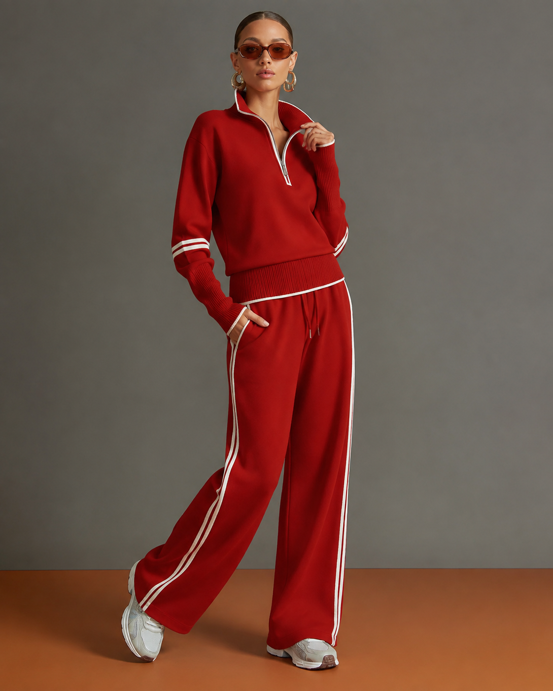 Conjunto de dos piezas rojo: jersey de punto con media cremallera y pantalón ancho a rayas