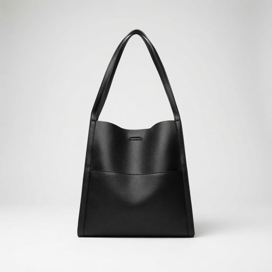 Bolso de mano de piel negro con asas cortas y cierre central rectangular