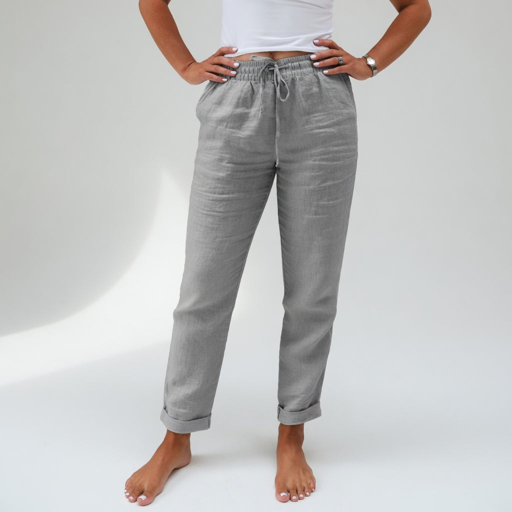 Pantalones de algodón holgados grises con cinturilla elástica y cordón