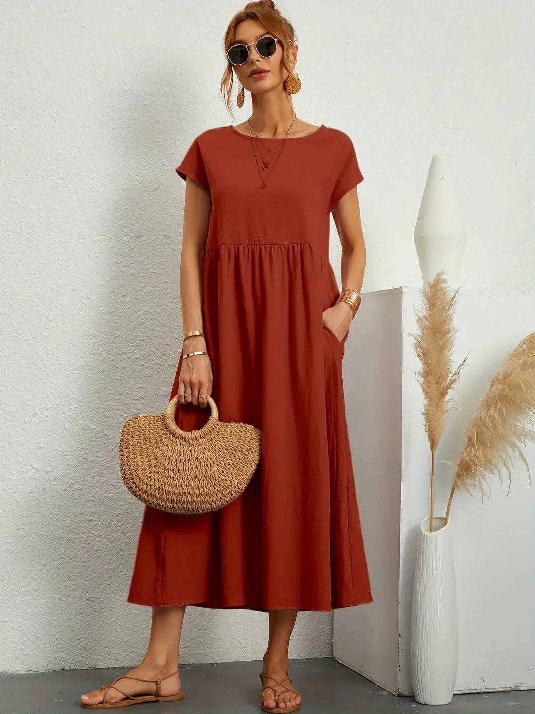 Vestido midi fluido color teja con manga tipo globo y cintura fruncida