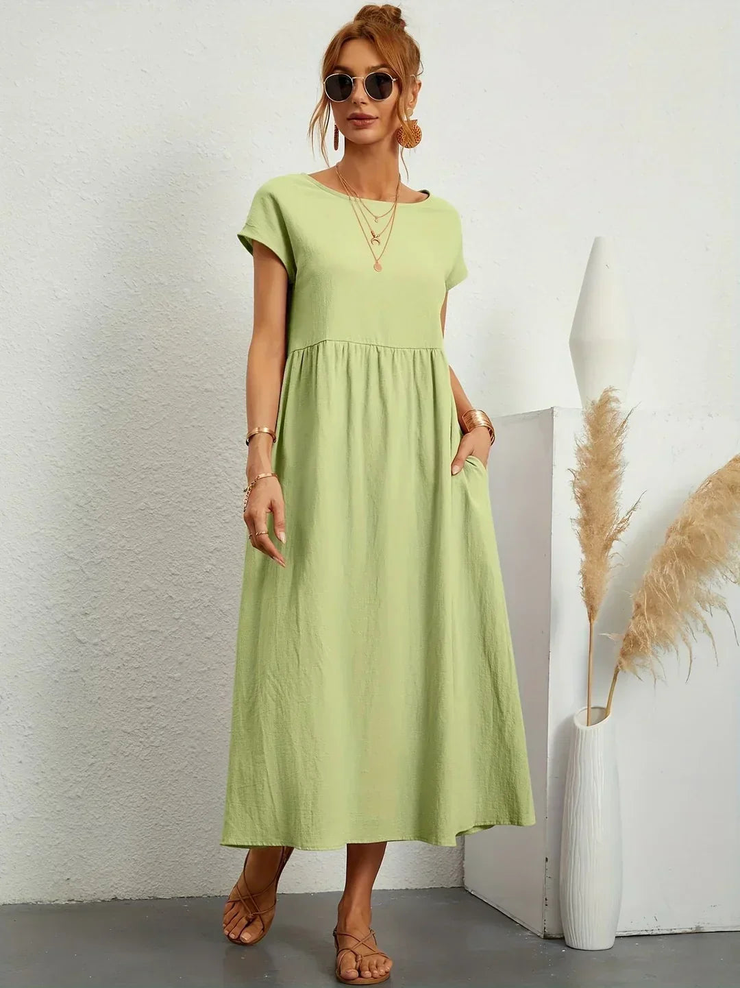 Vestido midi fluido verde menta con manga tipo globo y cintura fruncida