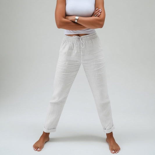 Pantalones de algodón holgados blancos con cinturilla elástica y cordón