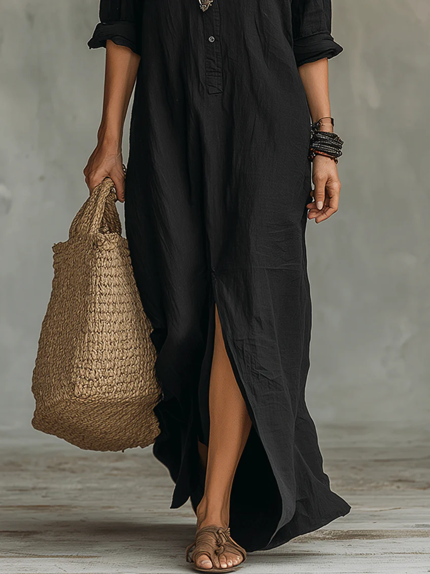 Vestido maxi negro con botones y abertura frontal, falda suelta