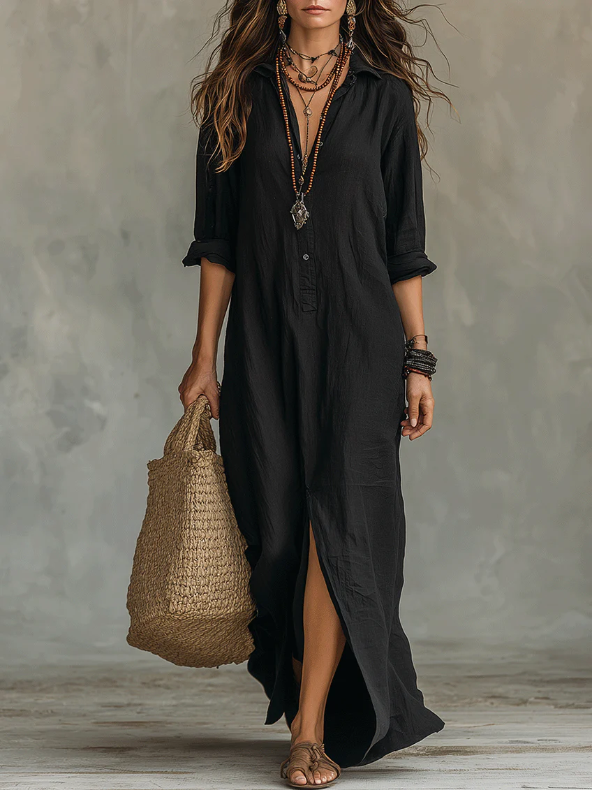 Vestido largo maxi negro con botones y abertura frontal, manga tres cuartos