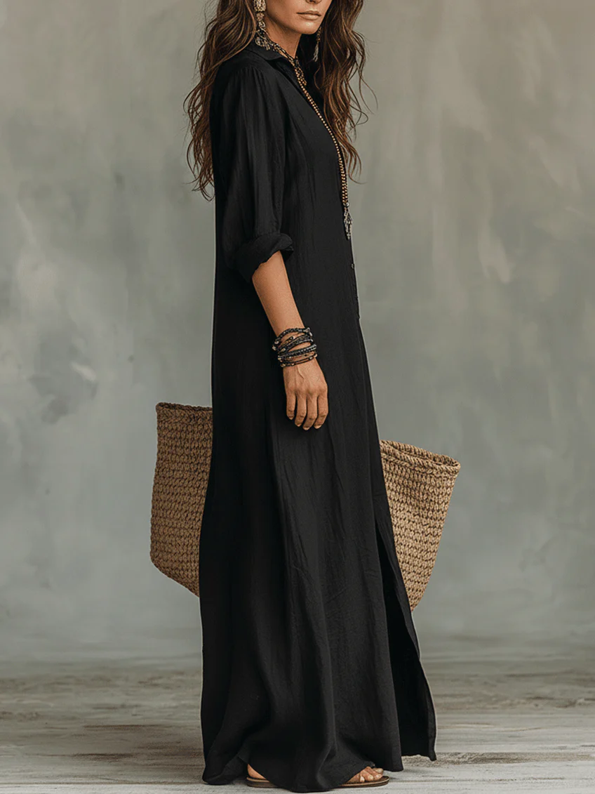 Vestido largo negro con botones, manga tres cuartos y caída amplia