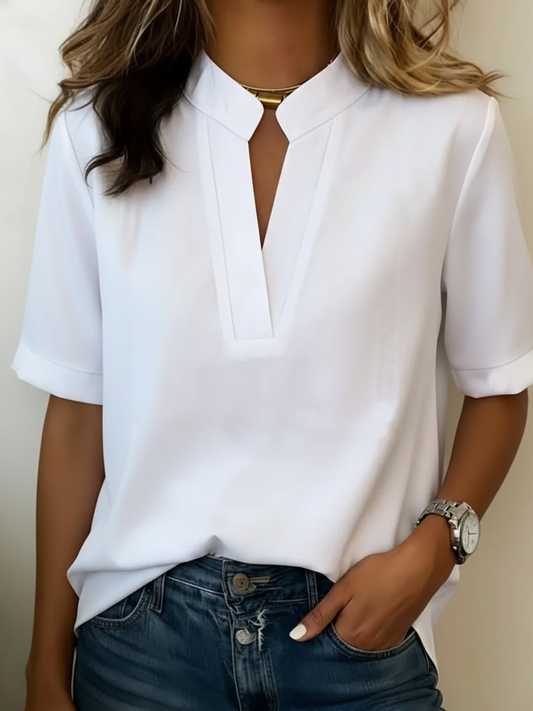 Blusa de manga corta con cuello V, color blanco, corte holgado y vista central